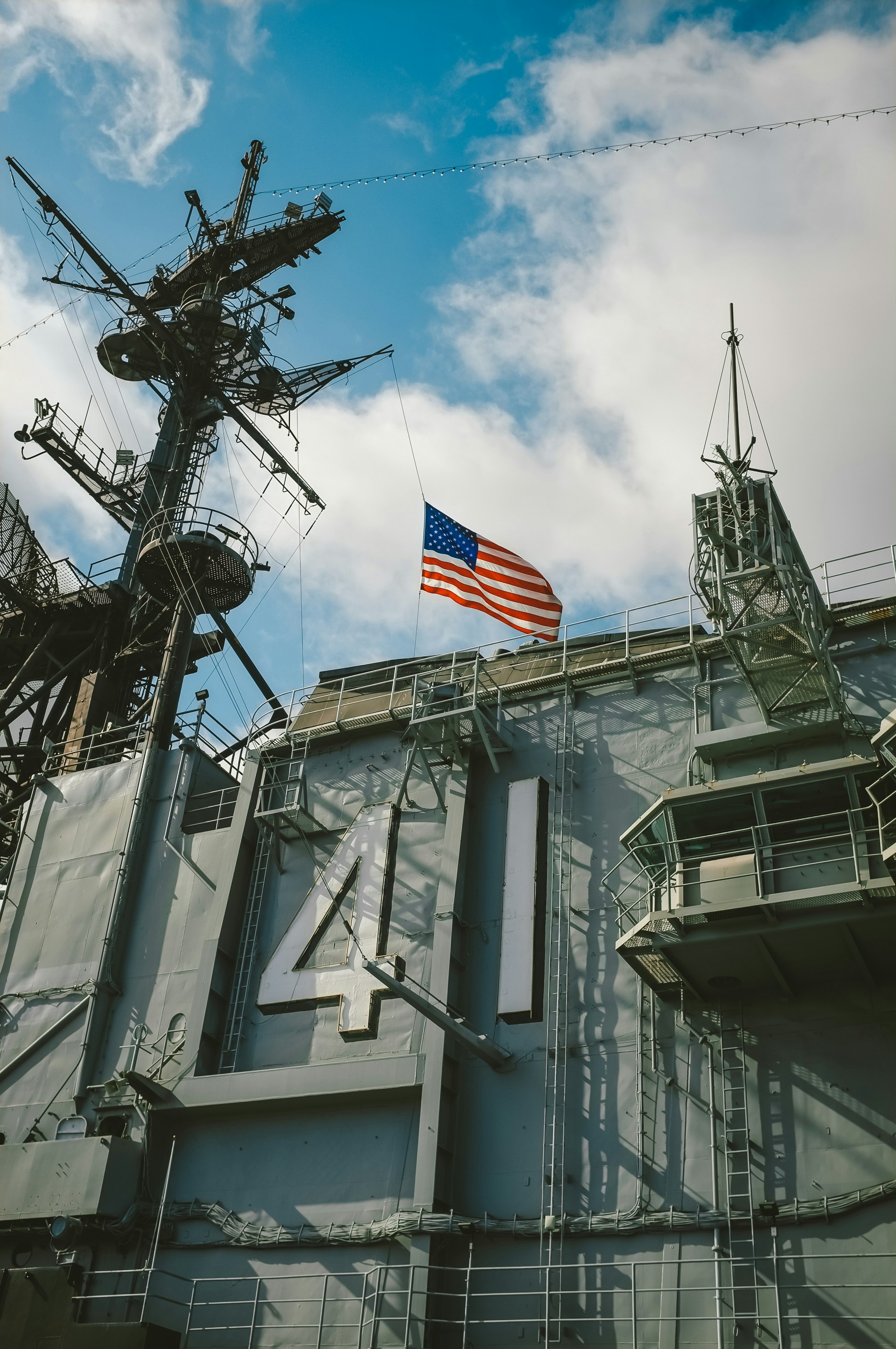 US flag on top of gray building